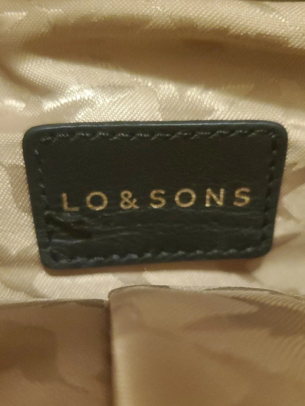 Lo & Sons Black Backpack with Gold Zipper Accents